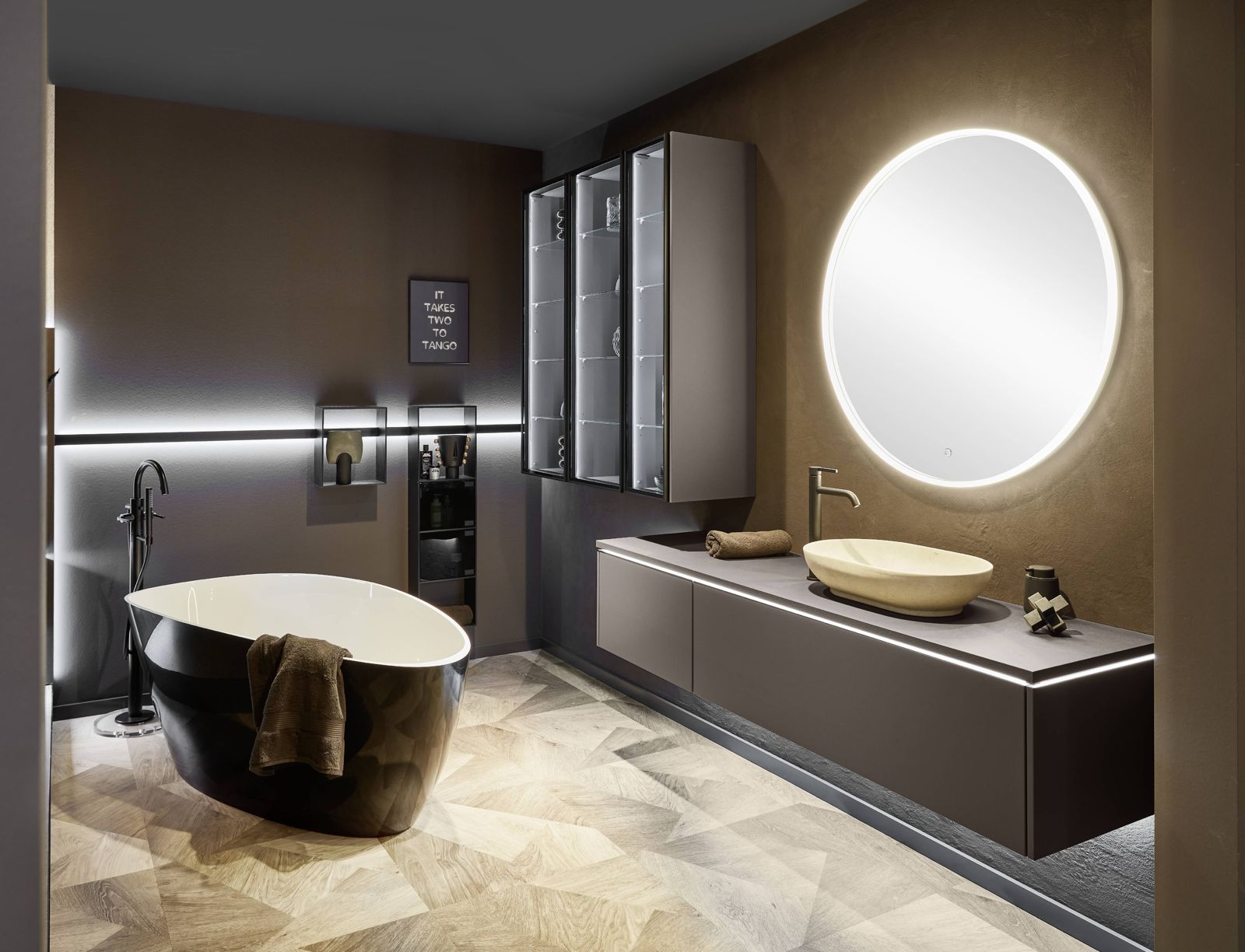 nobilia bathroom with vanity and round mirror